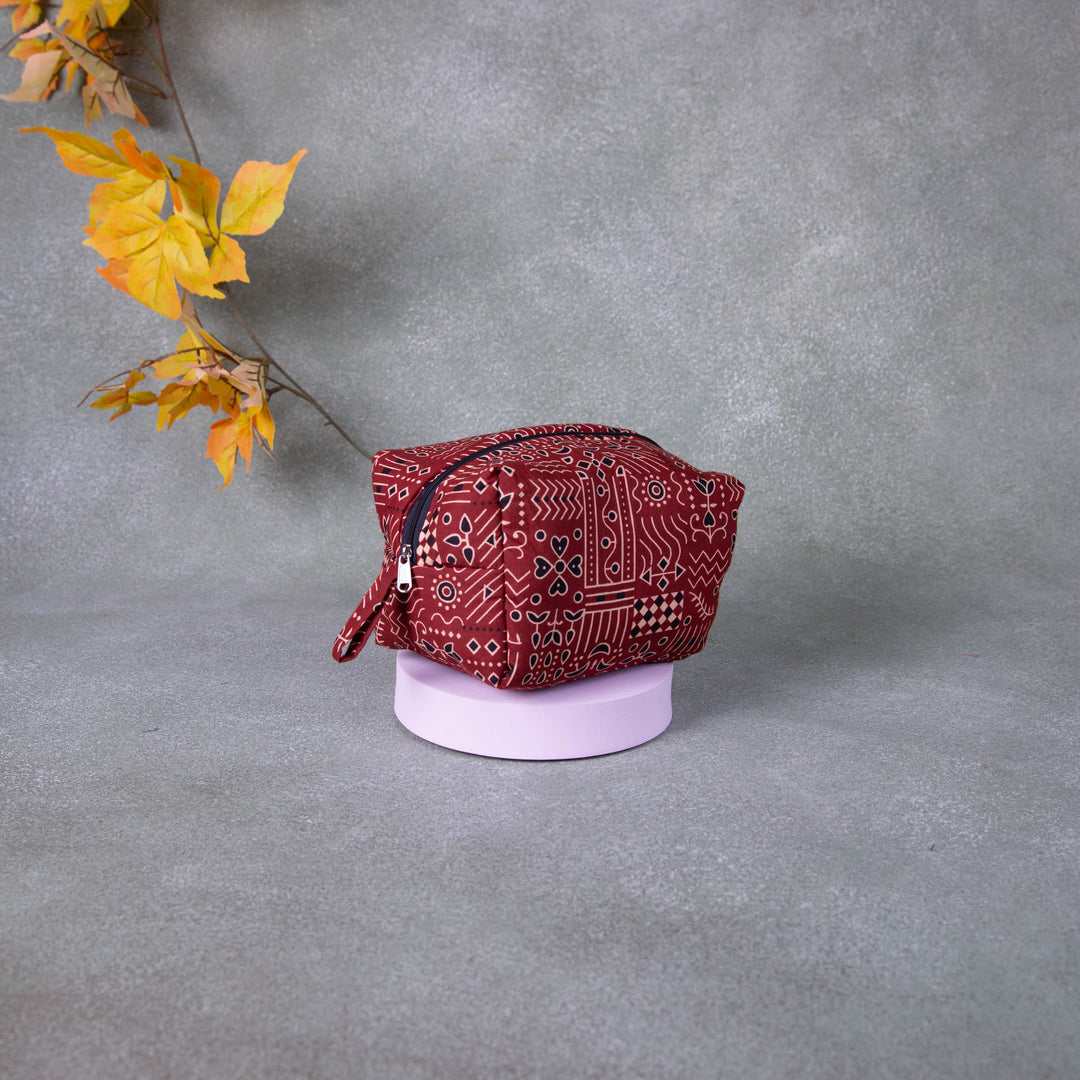 Vanity Pouch Maroon Colour with Black Dots Design.