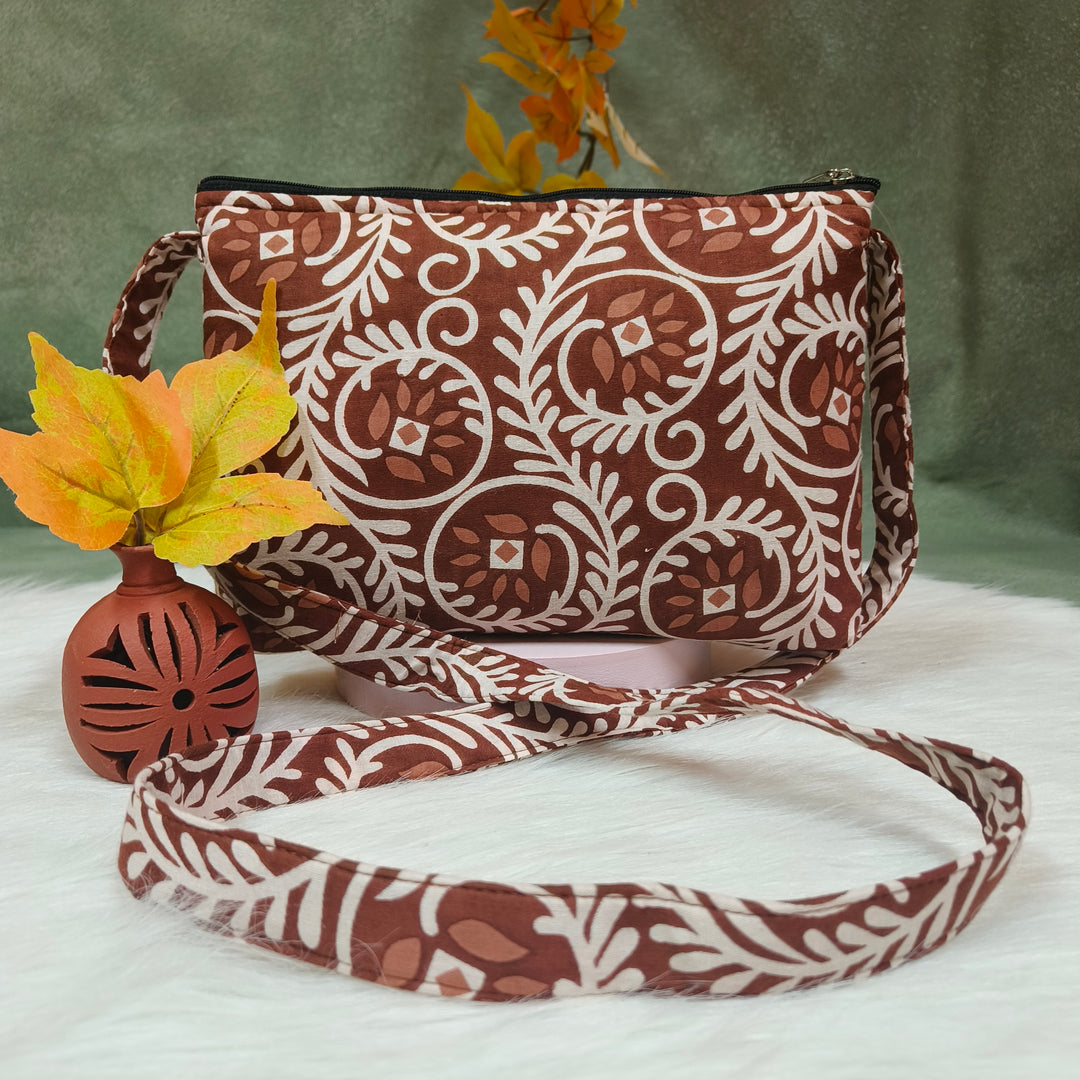 Bristlefront Everyday sling brown with white flower print