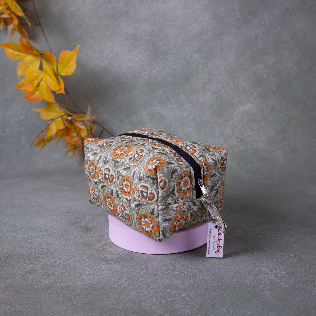 Vanity Pouch Green with Orange and White Flower Design.