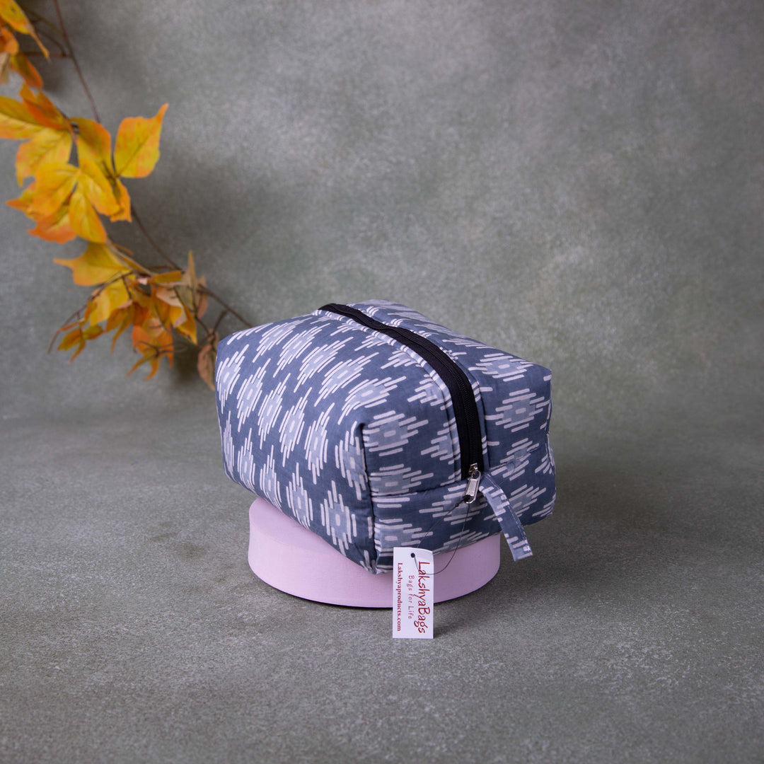 Vanity Pouch Grey Colour with White Geometrical Design.