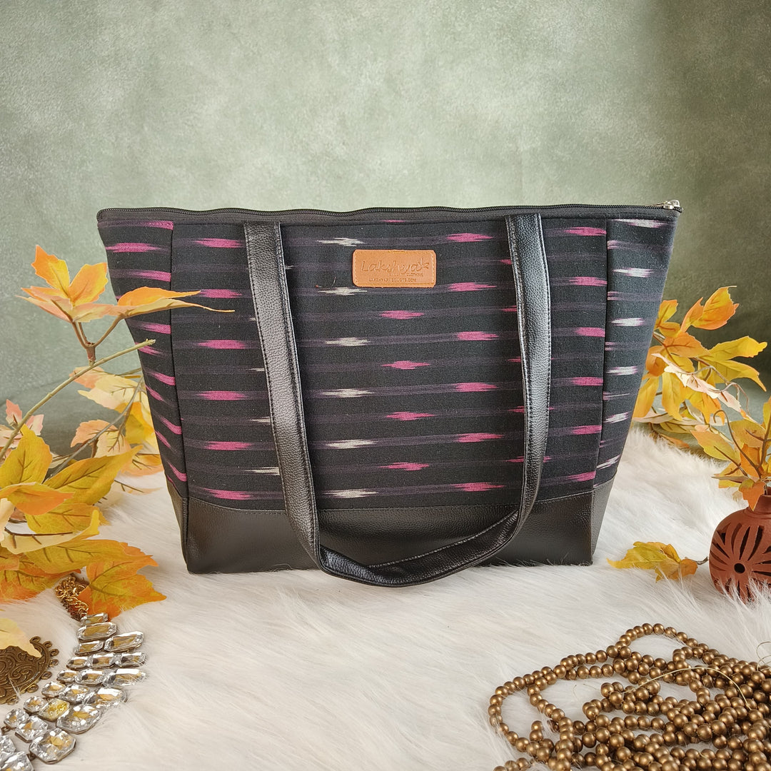 Sarus Crane Series Jumbo Tote Black Colour with Pink Horizontal Prints.