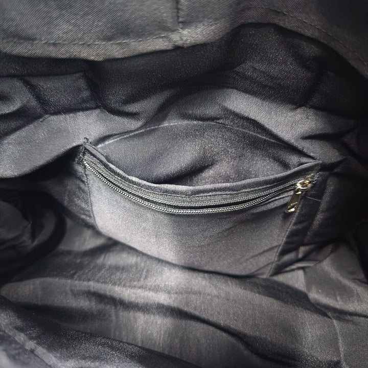 Barrel Handbags Black with White Prints.