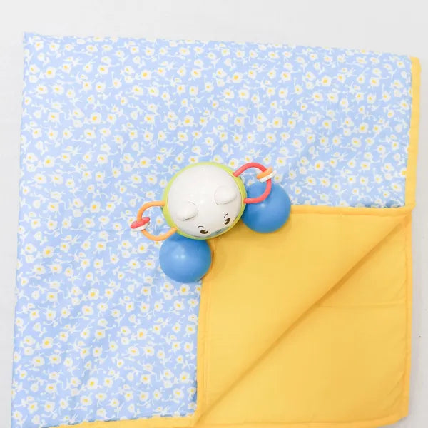 Baby Comforters Light Blue with Yellow and White Small Flower Design.