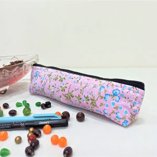 Pencil Pouches Pink with Blue Small Flower Design.