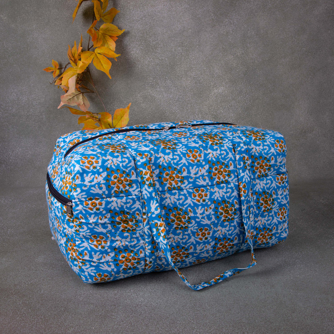 Rectangle Travel Bag Blue Colour with Mustered Prints.