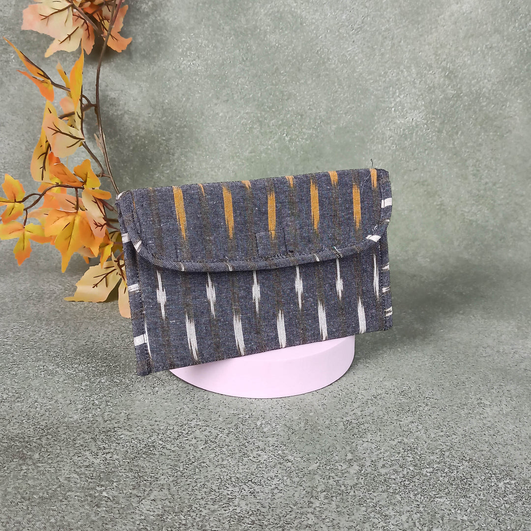 Ikat Clutch Grey Colour with Mustered Prints.