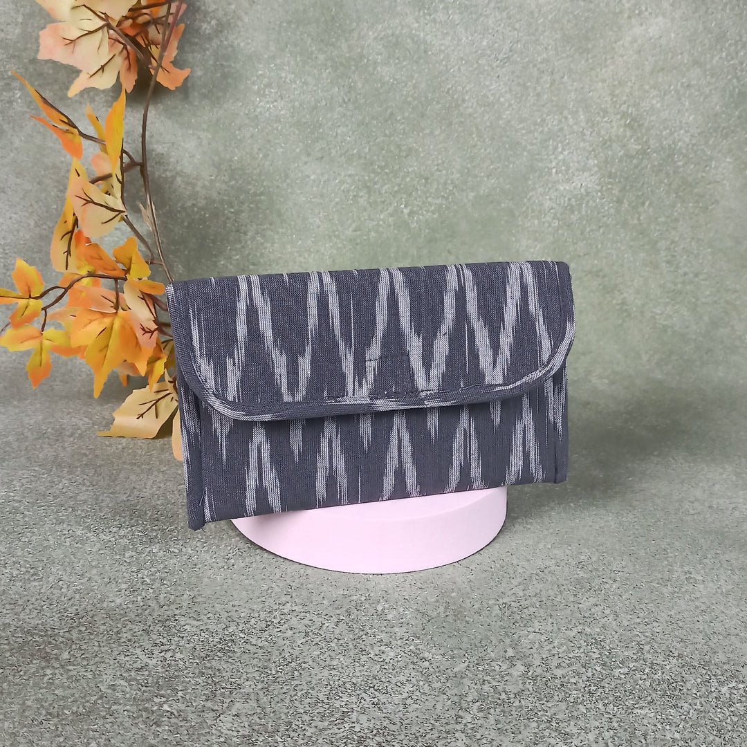 Ikat Clutch Grey Colour With White Zig Zag Design.