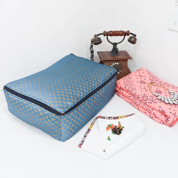 Saree Storage Bags Blue Colour with Small Golden Flower Design.