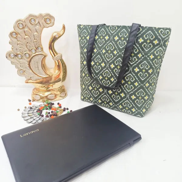 Sarus Crane Lifestyle Tote with Laptop Green with Yellow Prints.