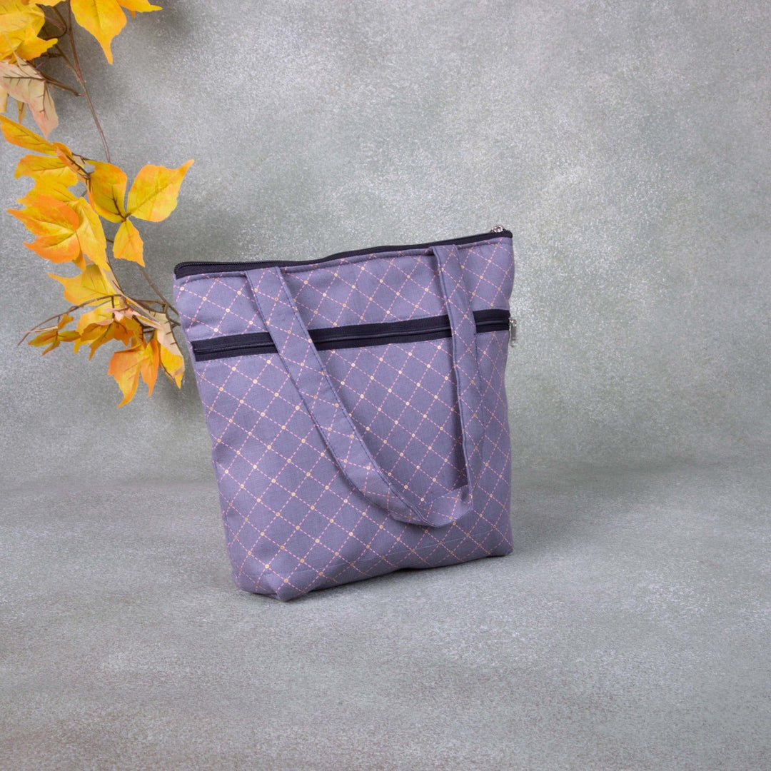 Small Handbag Grey Colour with Cross Design.