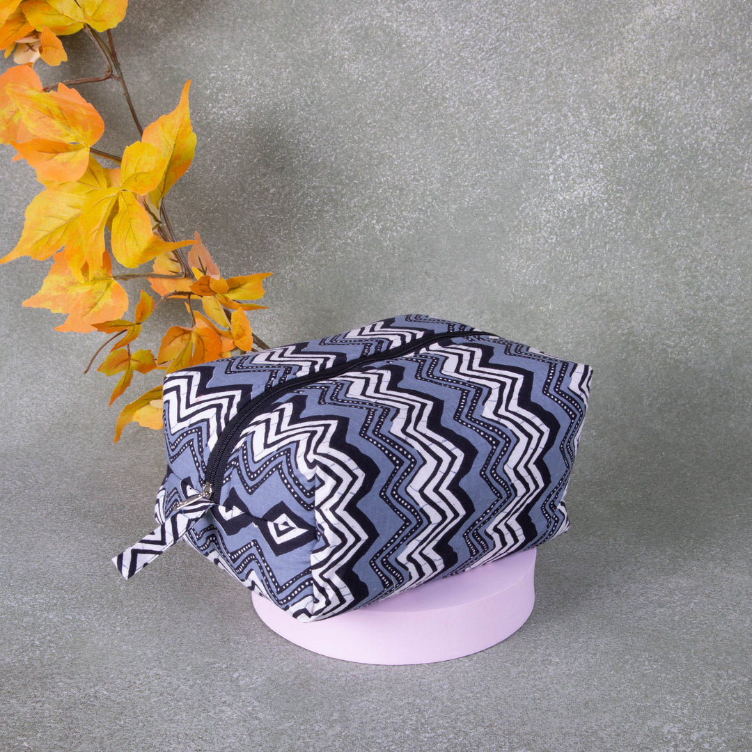 Vanity Pouch Grey Colour with Black Colour Zig zag Design.