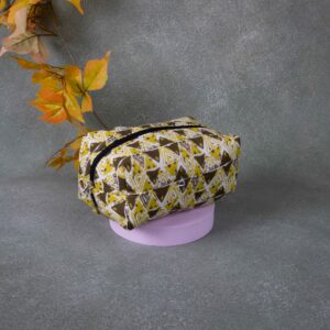 Vanity Pouch Yellow Colour with Small Triangle Design.