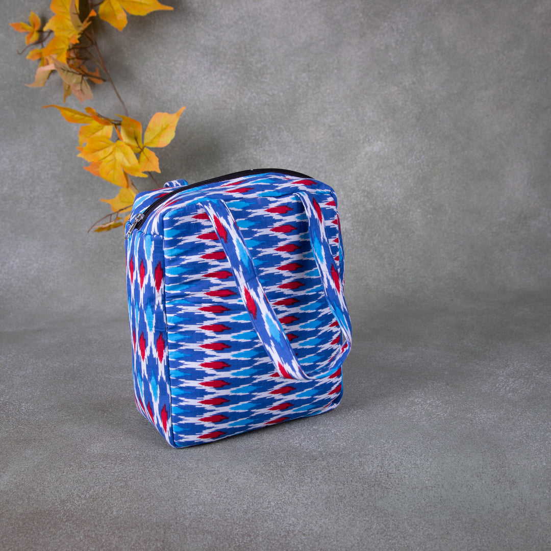 Water Proof Cotton Lunch Bag Blue with Red Ikat Prints.