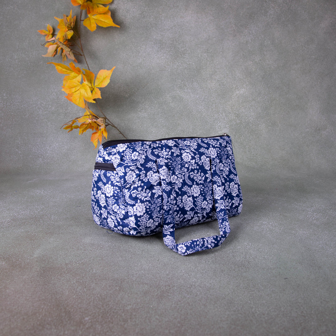 Barrel Handbags Blue with White Flower Design.