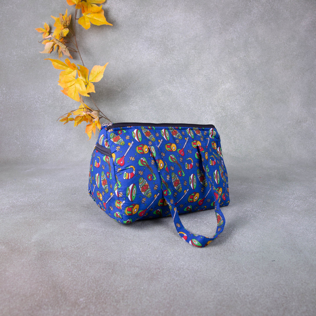 Barrel Handbags Blue Colour with Instrument Design. lakshya bags