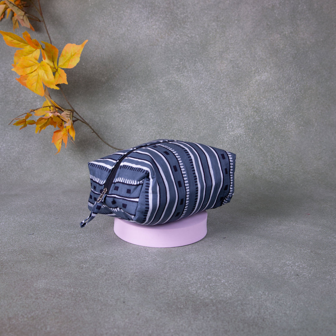 Vanity Pouch Grey Colour with White Line Prints.