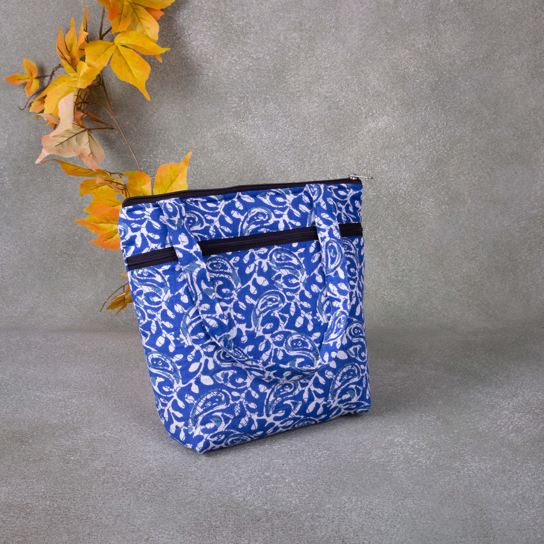Small Handbag Blue Colour with White Flower Design.