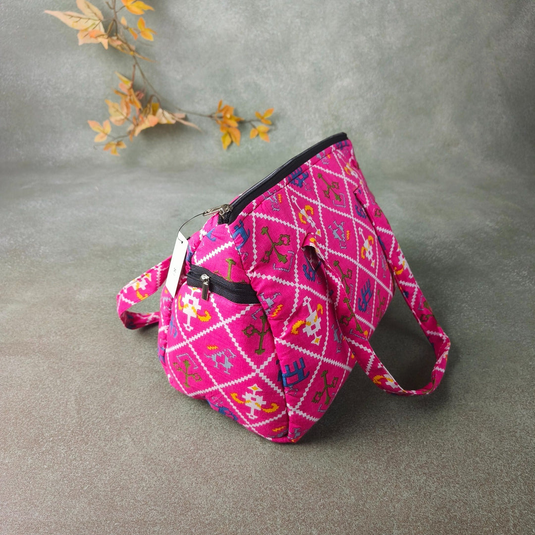 Barrel Handbags Pink with Coral Prints Design.