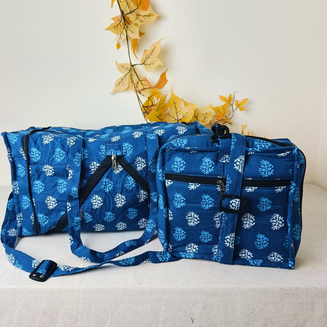 Expandable Travel Bag Blue with white Floral Design.