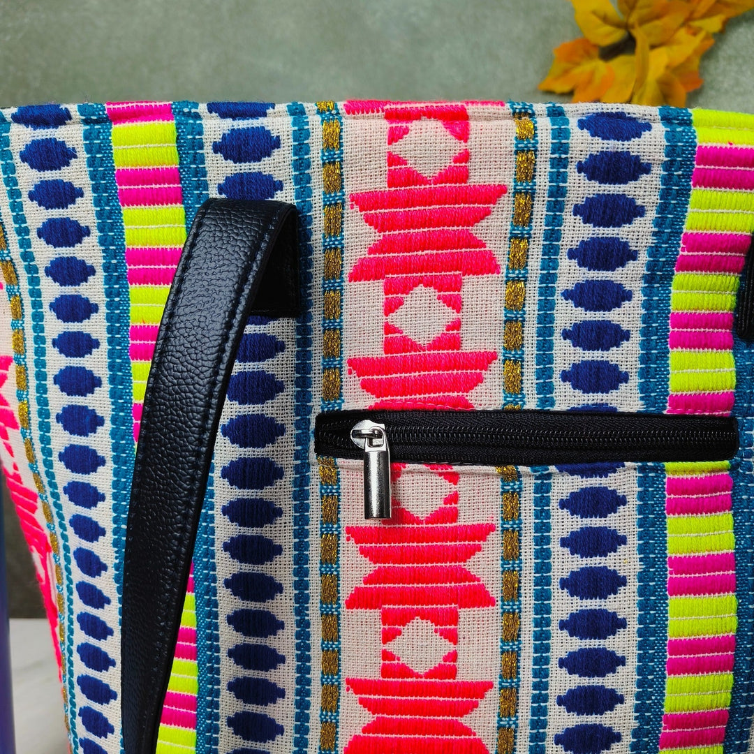 Dual Zip Fusion Tote With White Tribal Design.