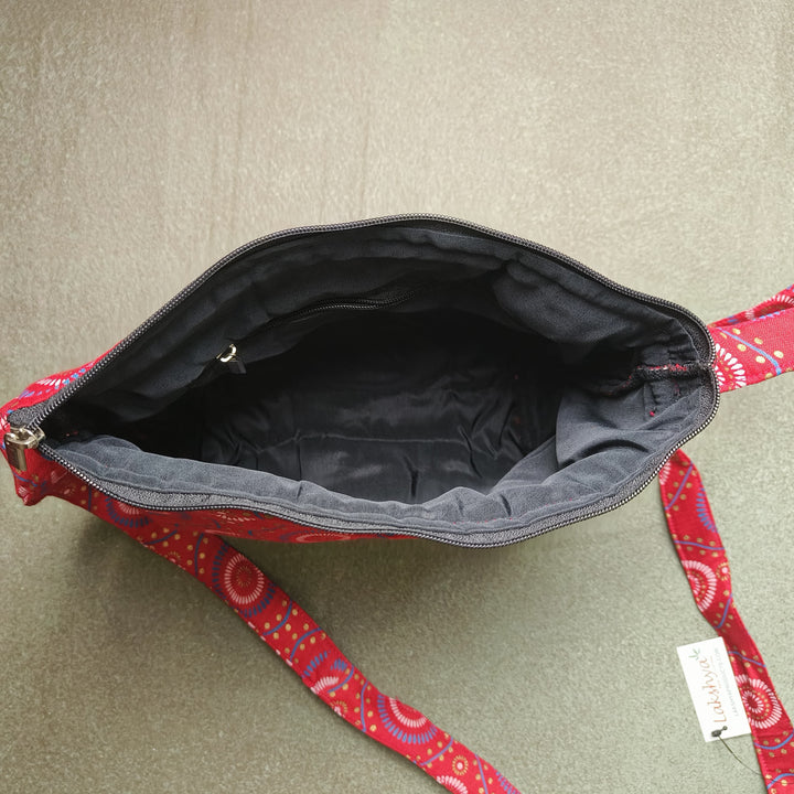 Bristlefront Everyday sling Black with Red Mango Design.