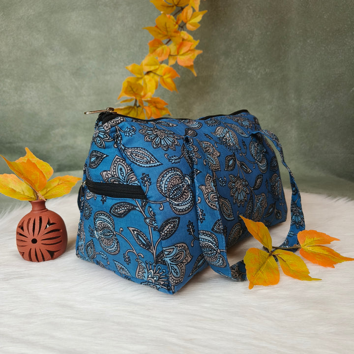 Barrel Handbag blue with floral print