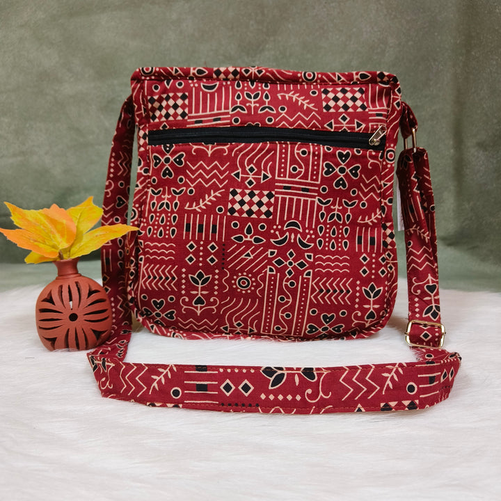 Xtra Sling bag maroon with strip print