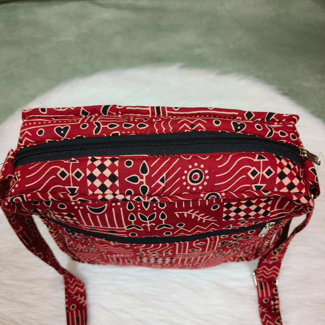 Xtra Sling bag maroon with strip print