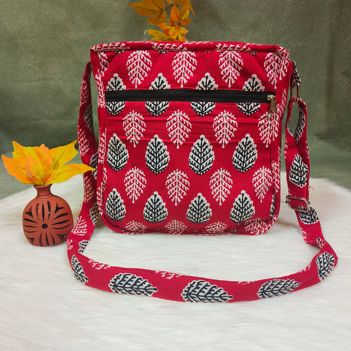 Xtra Sling bag blue with red Big leaf print