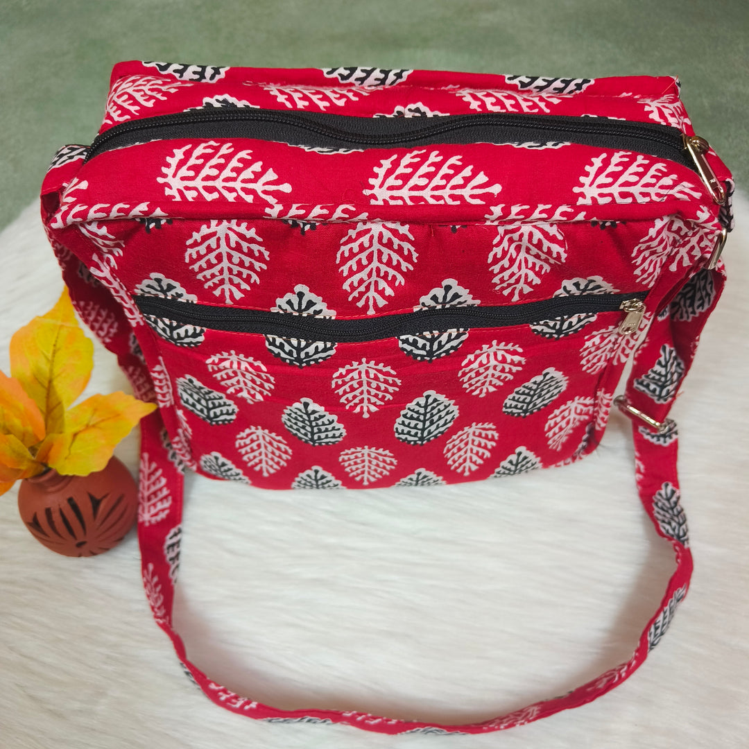 Xtra Sling bag blue with red Big leaf print