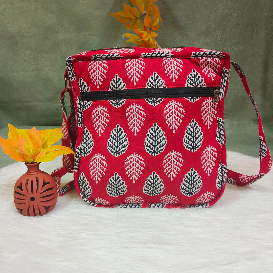 Xtra Sling bag blue with red Big leaf print