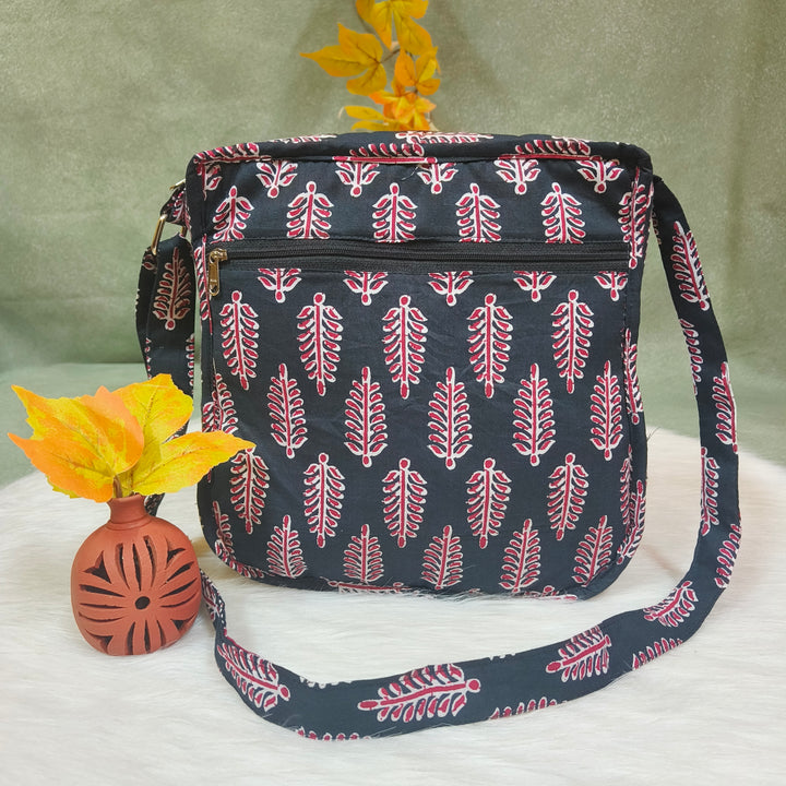Xtra Sling bag blue with black with leaf print