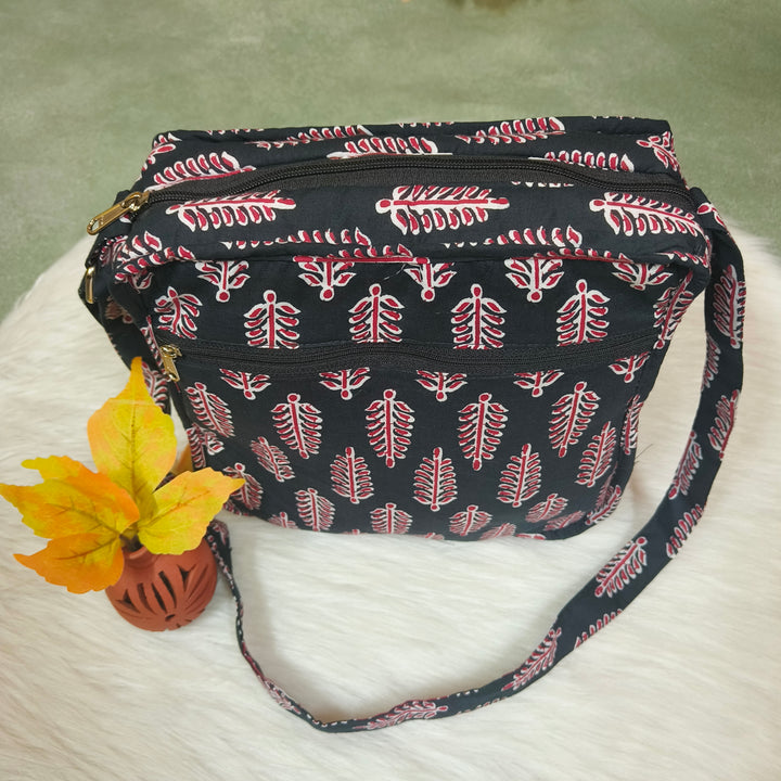 Xtra Sling bag blue with black with leaf print