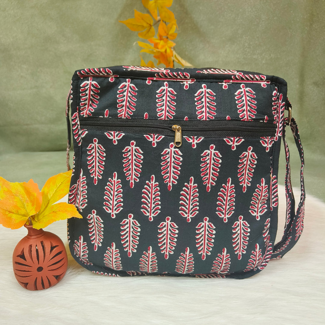 Xtra Sling bag blue with black with leaf print