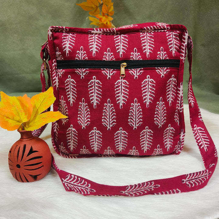 Xtra Sling bag Maroon with leaf print