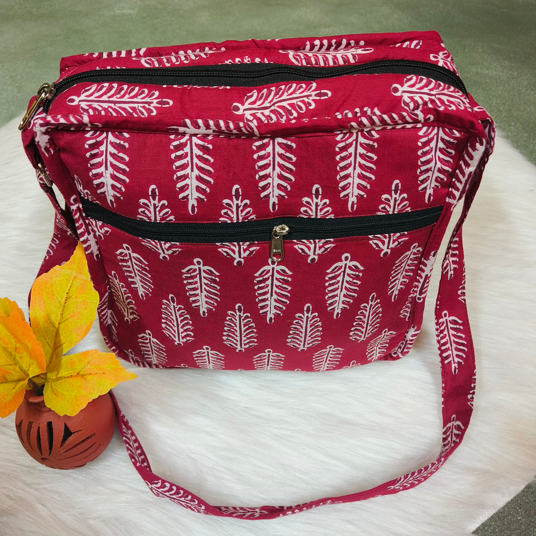 Xtra Sling bag Maroon with leaf print