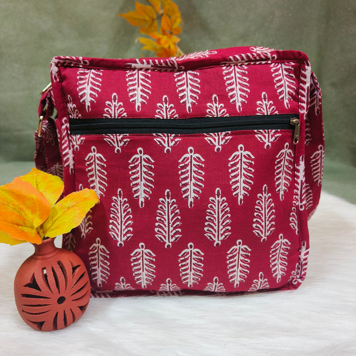 Xtra Sling bag Maroon with leaf print