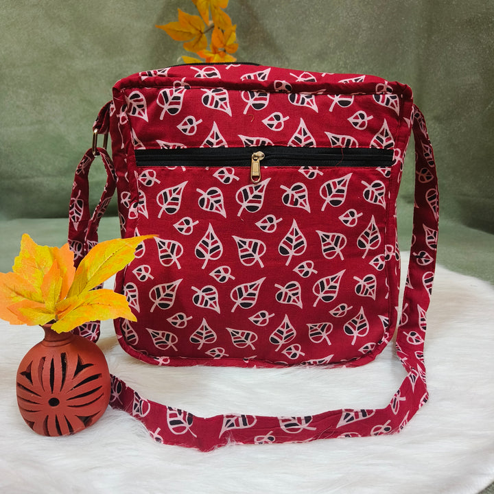Xtra Sling bag red with leaf print