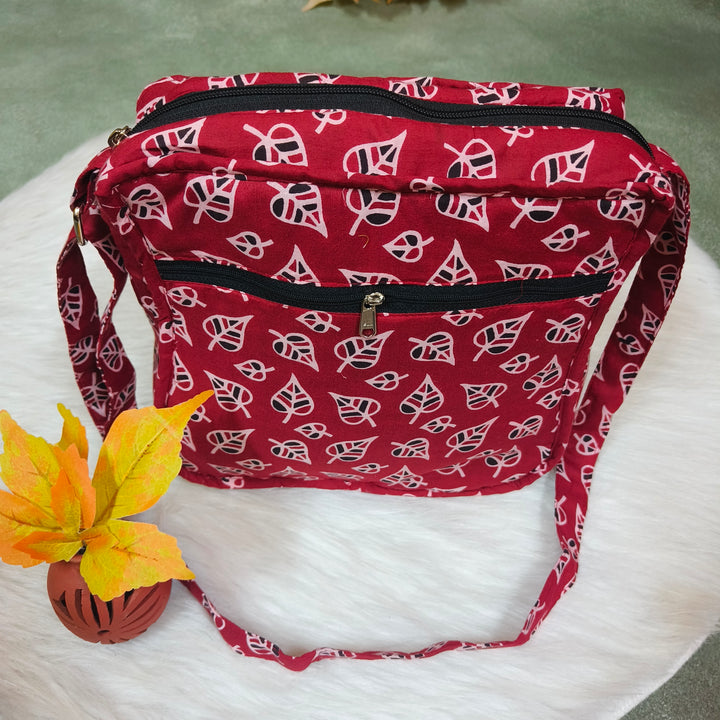 Xtra Sling bag red with leaf print