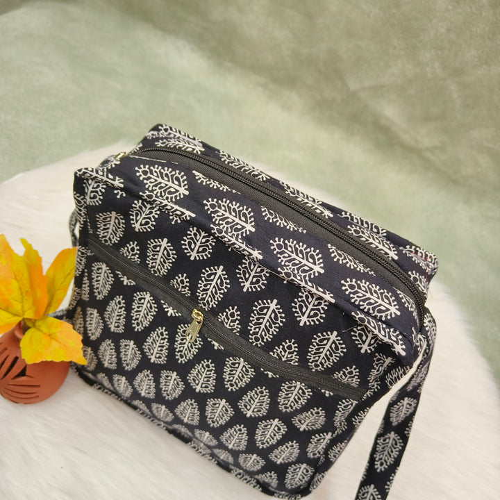 Xtra Sling bag Black with leaf print