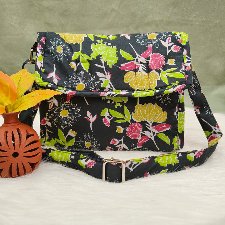 Multizipper Sling 4 Zips Black with multi color flower print