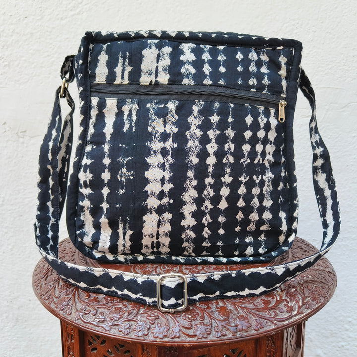 Xtra Sling bag black with white line print