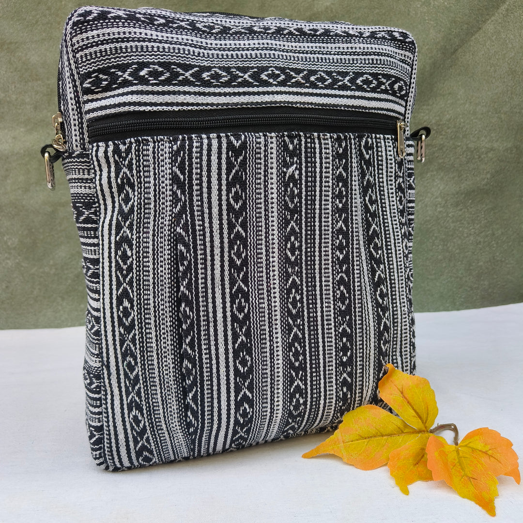 Lap sling cum backpack Black with white xox print