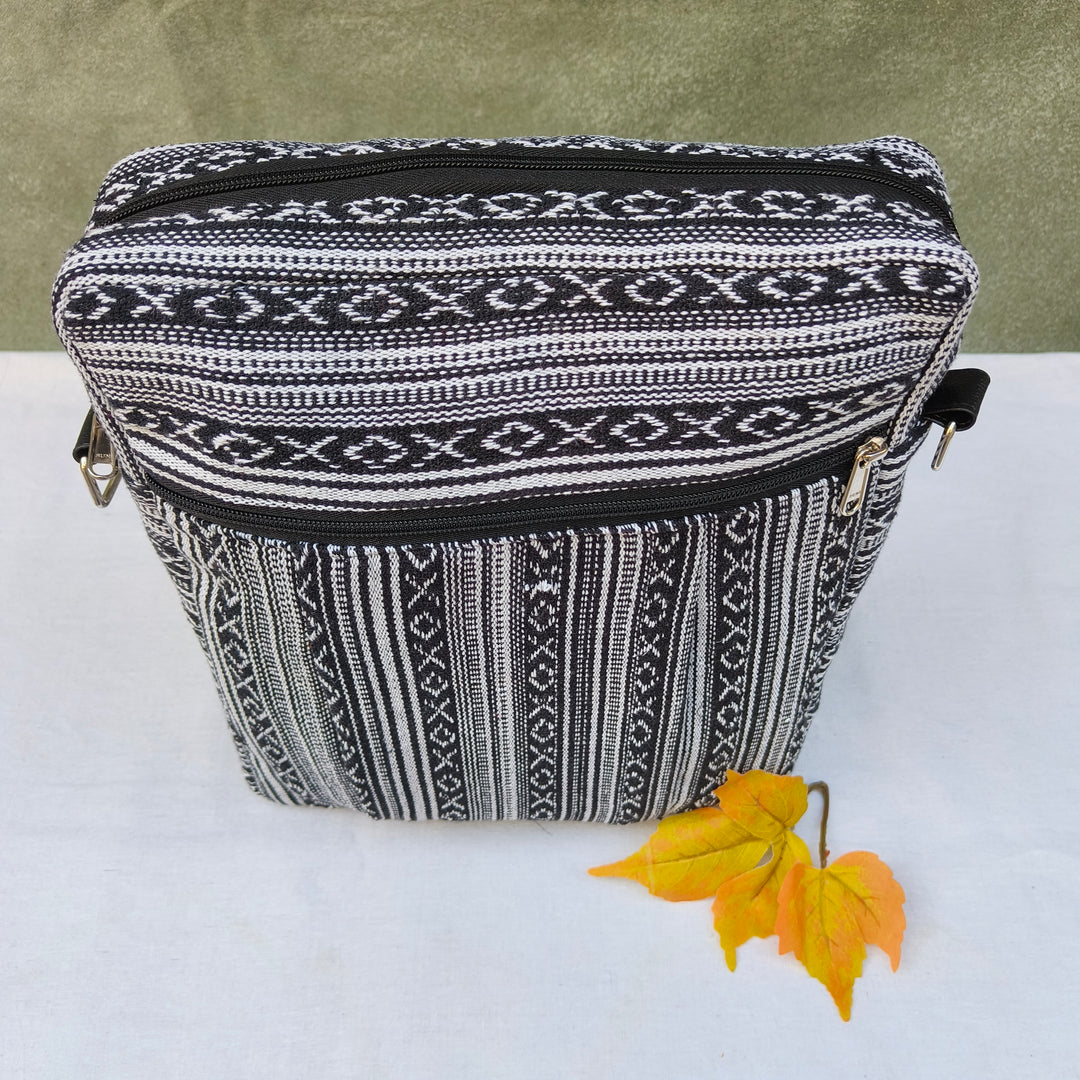 Lap sling cum backpack Black with white xox print