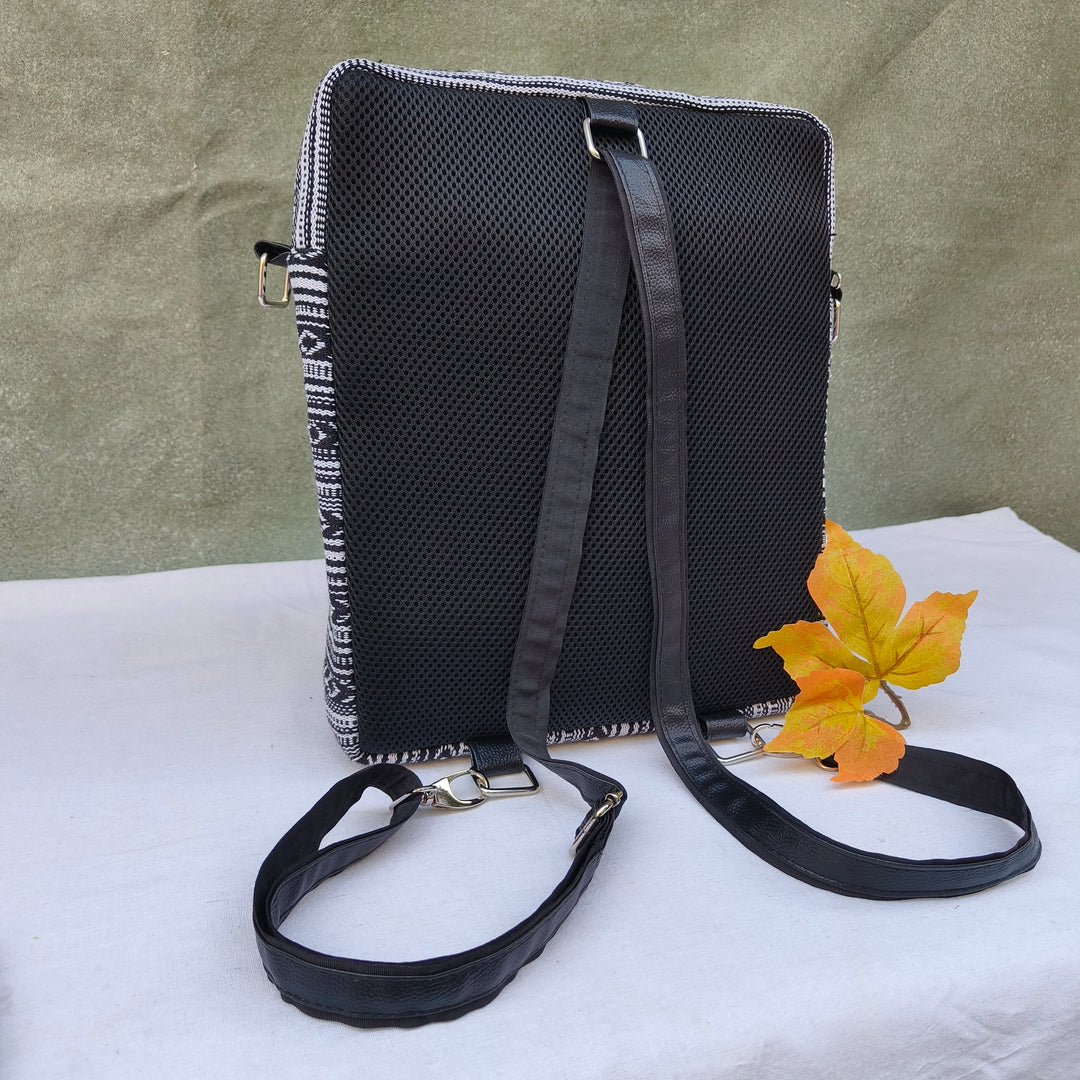 Lap sling cum backpack Black with white xox print