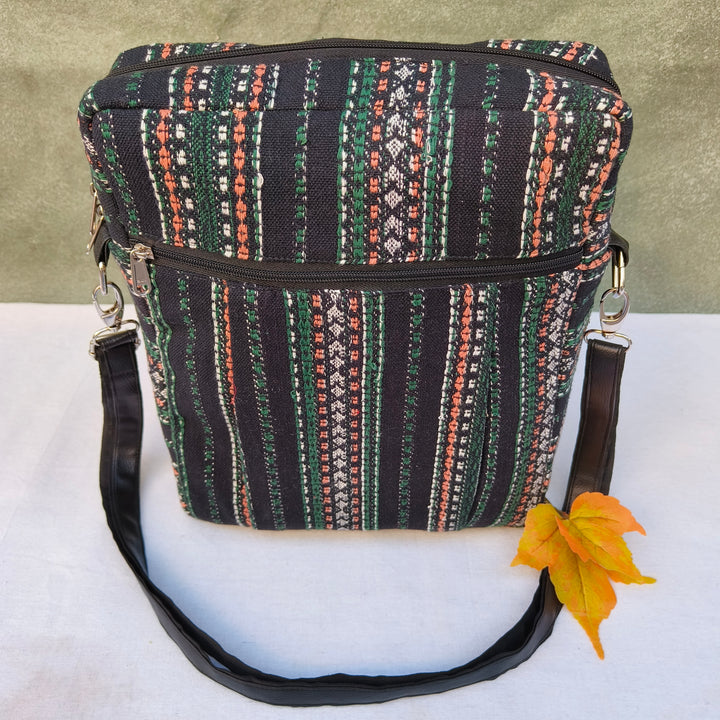 Lap sling cum backpack Black with multicolor lines