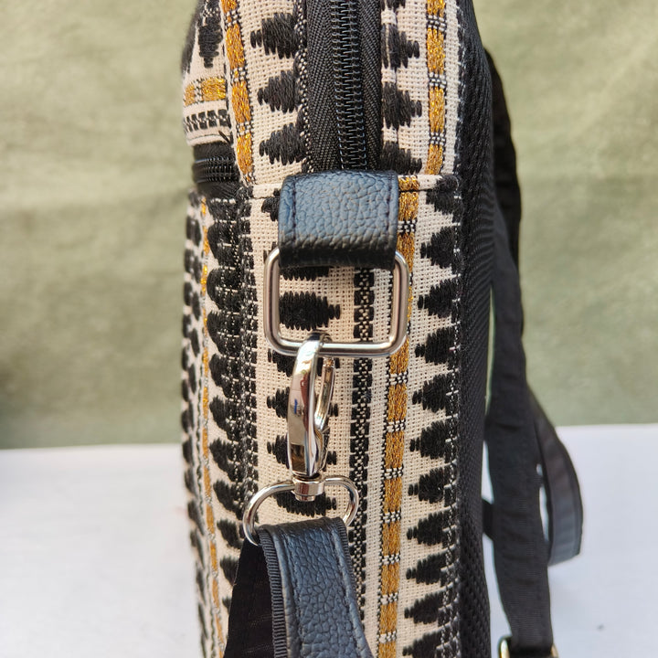 Lap sling cum backpack white with black oval print