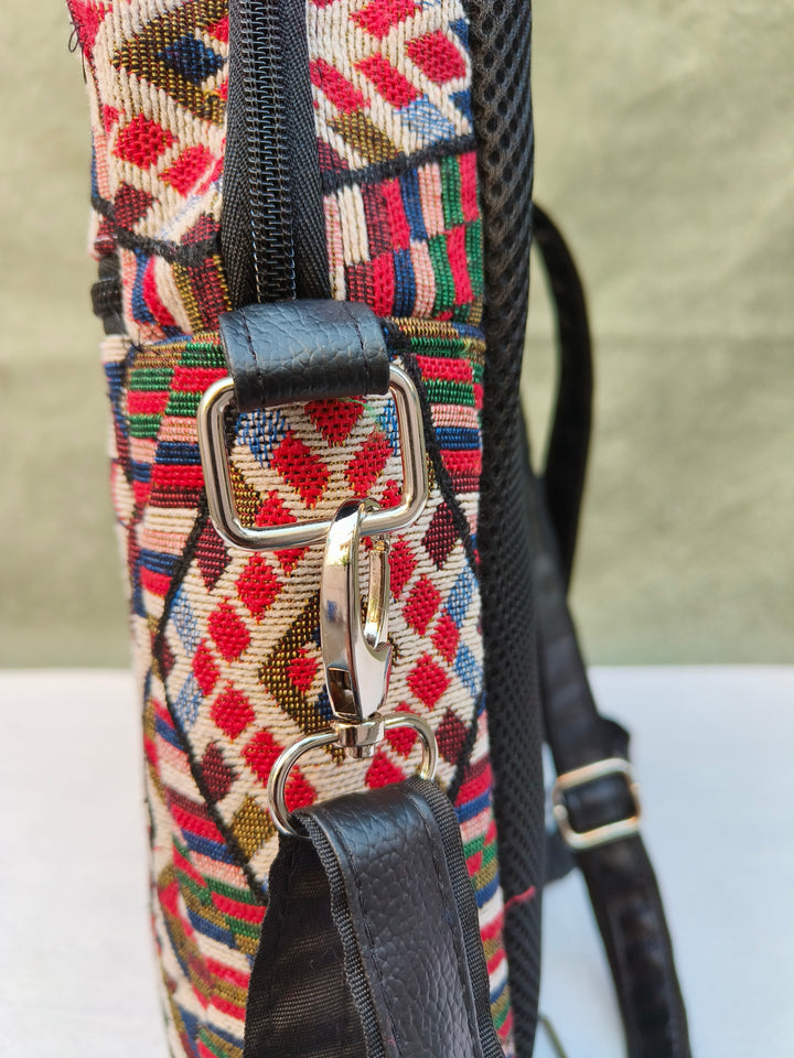 Lap sling cum backpack multicolor with Folk Loom Print