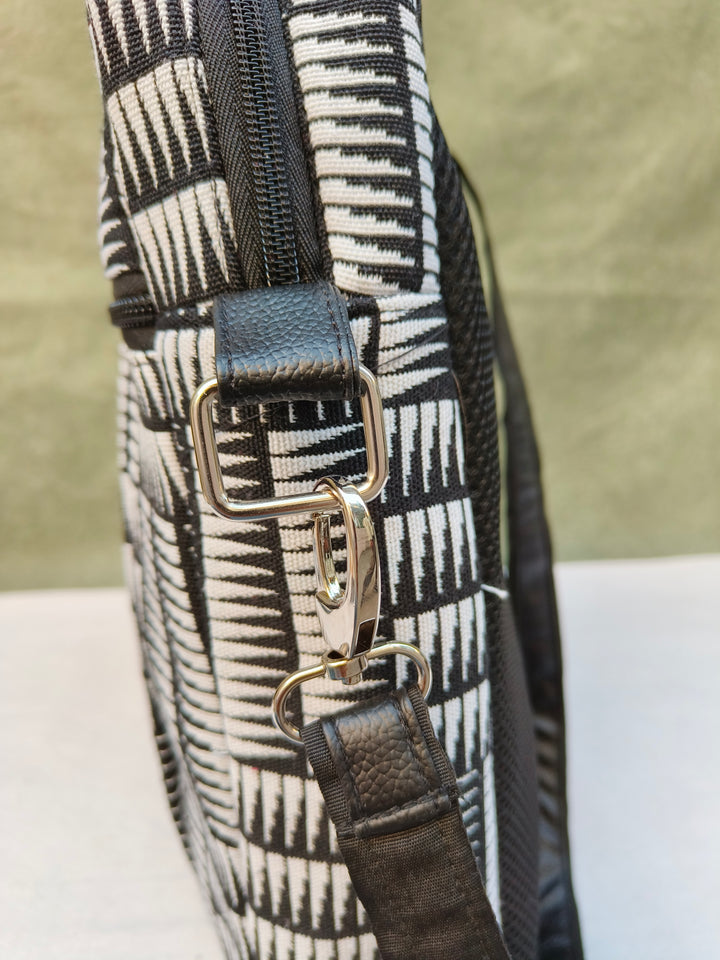 Lap sling cum backpack Black with white strip print