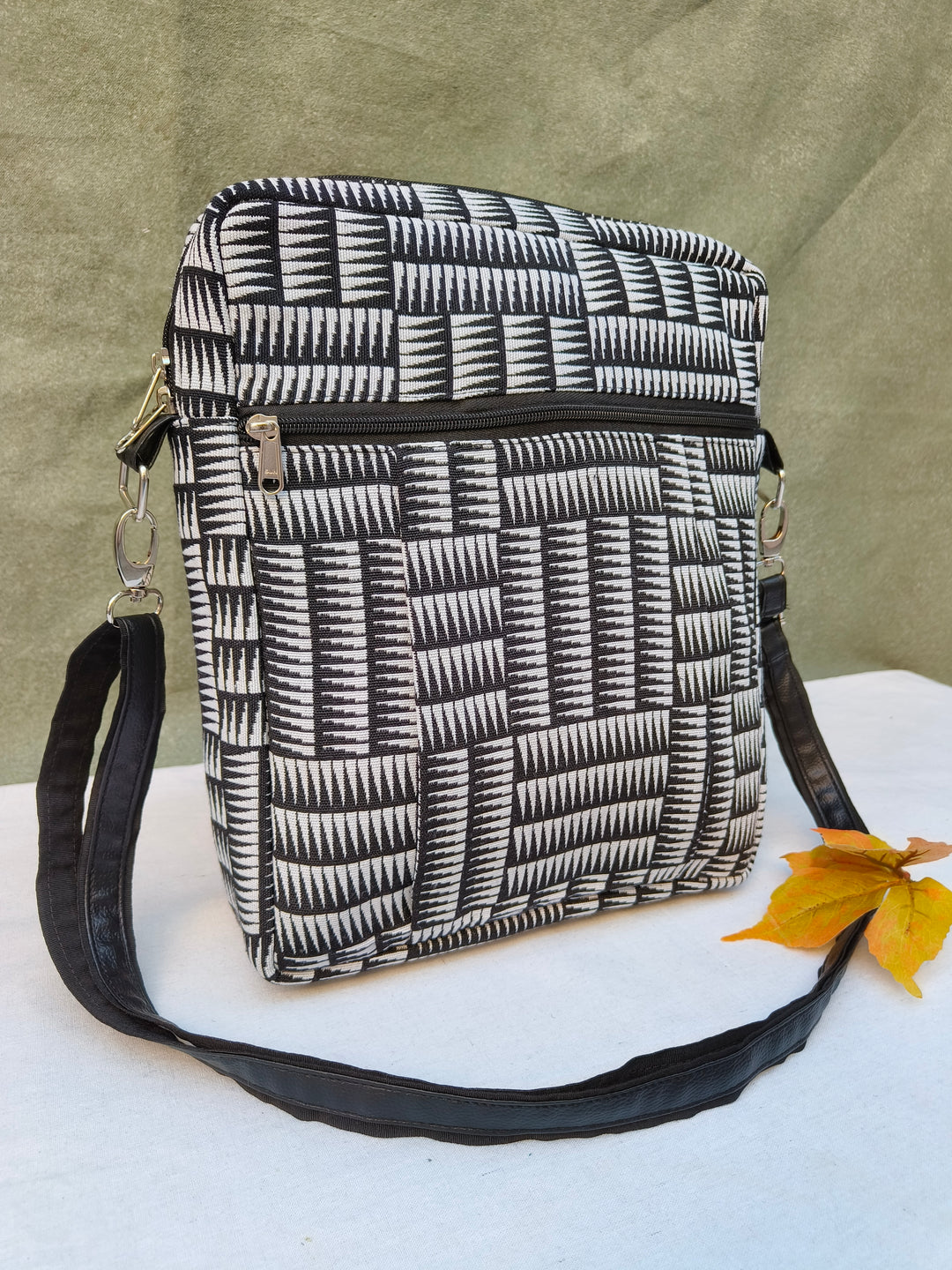 Lap sling cum backpack Black with white strip print